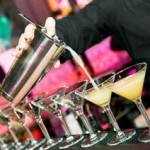 barmanâs hand with shaker and cocktails